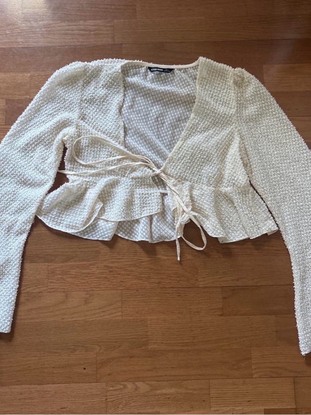 Ivory Textured Tie-Front Peplum Blouse